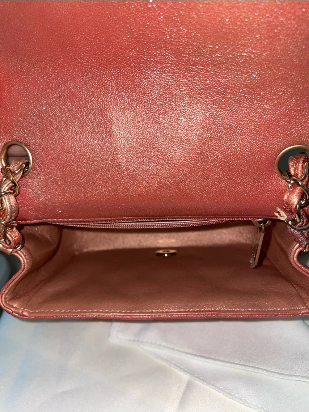CHANEL Quilted Mini Flap Bag in Metallic Rose